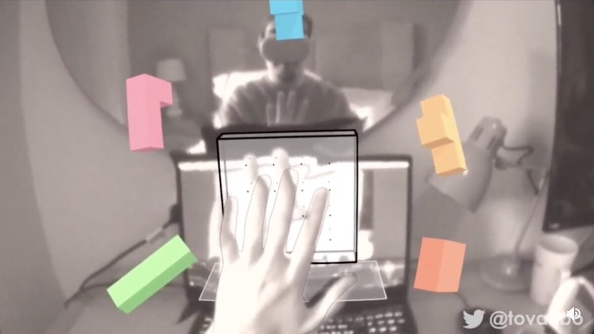 Spieler berührt digitale Spielemente in physischer Umgebung